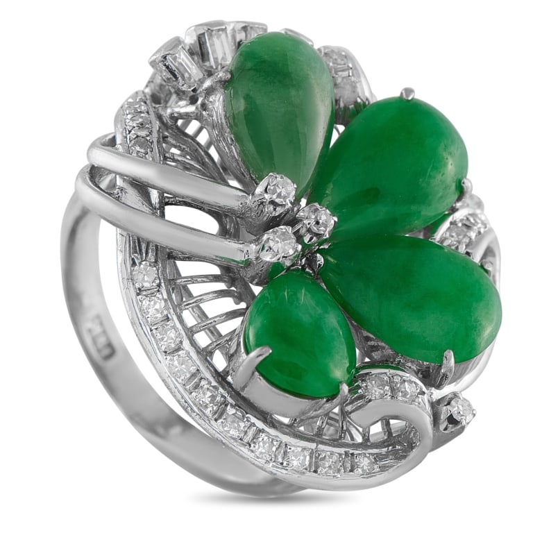 18K WHITE GOLD 0.35CT DIAMOND AND JADE RING: *SPECIAL SHIPPING on Luxury Jewelry READ BELOW* This luxury ring is incredibly unique. Bold and expressive, Jade cabochons make a statement at the center of the detailed 18K White Gold setting. Diamon