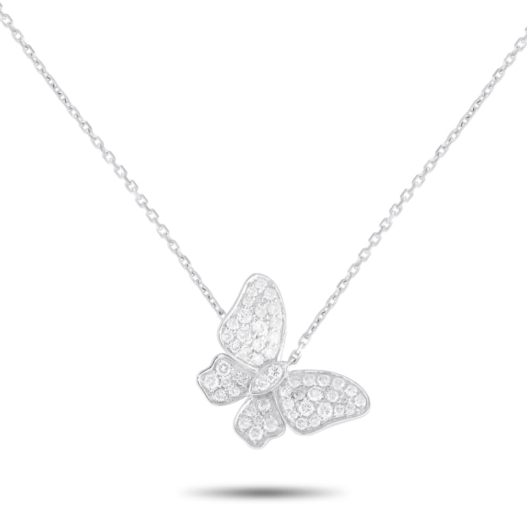 18K WHITE GOLD 0.65CT DIAMOND BUTTERFLY NECKLACE: *SPECIAL SHIPPING on Luxury Jewelry READ BELOW* This necklace possesses an undeniable charm. Crafted entirely from 18K White Gold, it features a butterfly pendant measuring 0.75 long suspended from a