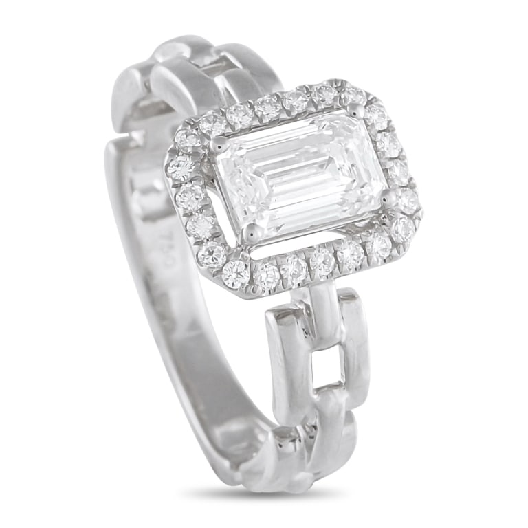 18K WHITE GOLD 1.25CT DIAMOND SQUARE LINK RING 6: *SPECIAL SHIPPING on Luxury Jewelry READ BELOW* This piece sets its 1.05-carat emerald-cut diamond center stone apart with intention. Four claw prongs hold the central gem high, leaving a slim gap bef