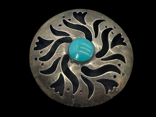 MEXICO CUT OUT STERLING DISC TURQUOISE PENDANT 10G: *For ALTERNATIVE SHIPPING QUOTES or local PICKUP details, please visit www.dejavuauctionshipping.com* TAXCO MEXICO SIGNED Hollow ware with turquoise center and cut out design Has pin and pendant hook