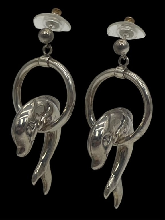 BOLD JUMPING DOLPHINS STERLING SILVER EARRINGS 10G: *For ALTERNATIVE SHIPPING QUOTES or local PICKUP details, please visit www.dejavuauctionshipping.com* STUNNING dolphins jumping in a hoop Hollow ware sterling silver in a big bold design Hangs from po