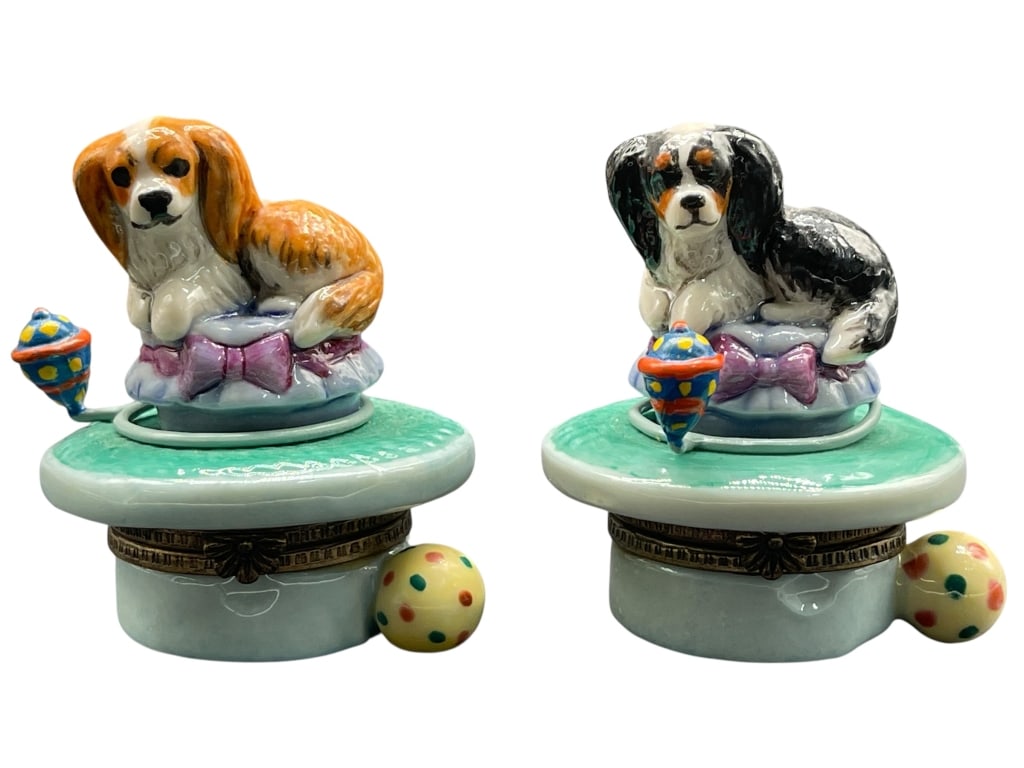 KAPRI PORCELAIN DOG TRINKET BOXES PAIR: For ALTERNATE shipping quote or LOCAL PICK-UP DETAILS, please visit dejavuauctionshipping.com PAIR OF HAND-PAINTED PORCELAIN DOG FIGURAL TRINKET BOXES SIGNED KAPRI Charming pair of hand-painted porcel