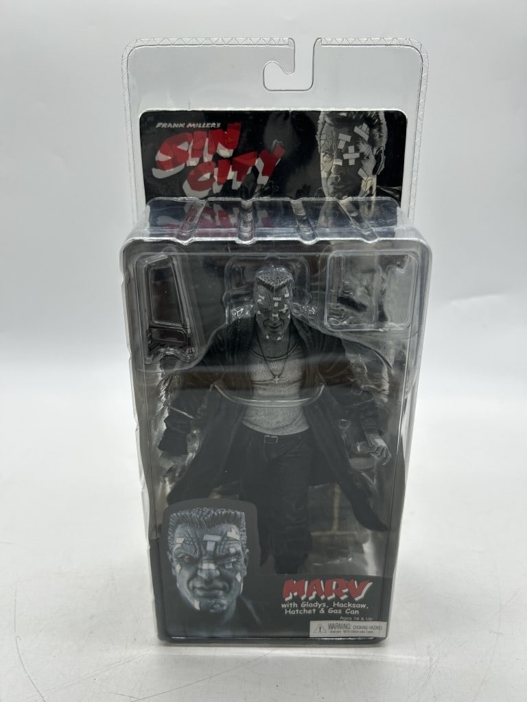 SIN CITY MARV ACTION FIGURE FRANK MILLER NECA: For ALTERNATE shipping quote or LOCAL PICK-UP DETAILS, please visit dejavuauctionshipping.com NECA SIN CITY MARV ACTION FIGURE WITH GLADYS HACKSAW HATCHET & GAS CAN Collectible Marv action figure from