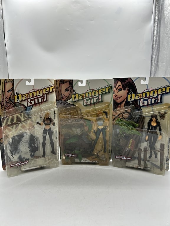 3 SEALED DANGER GIRL ACTION FIGURE COLLECTOR LOT: For ALTERNATE shipping quote or LOCAL PICK-UP DETAILS, please visit dejavuauctionshipping.comDANGER GIRL ACTION FIGURE COLLECTION LOT OF 3 SEALEDGroup of three Danger Girl ultra action figures based