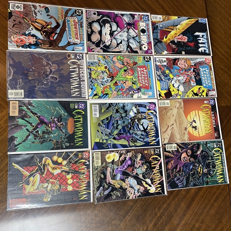 DC COMIC BOOK LOT OF 12 CATWOMAN JUSTICE LEAGUE: For ALTERNATE shipping quote or LOCAL PICK-UP DETAILS, please visit dejavuauctionshipping.com MIXED DC COMIC BOOK LOT OF 12 CATWOMAN JUSTICE LEAGUE Lot of twelve mixed **DC Comics** featuring a select