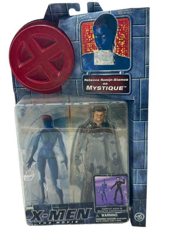 X-MEN MYSTIQUE REBECCA ROMIJN-STAMON ACTION FIGURE: For ALTERNATE shipping quote or LOCAL PICK-UP DETAILS, please visit dejavuauctionshipping.com X-MEN THE MOVIE MYSTIQUE REBECCA ROMIJN-STAMOS ACTION FIGURE Vintage Marvel X-Men: The Movie Mystique acti