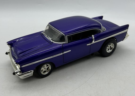 1957 CHEVROLET BEL AIR DIECAST MODEL CAR PURPLE: For ALTERNATE shipping quote or LOCAL PICK-UP DETAILS, please visit dejavuauctionshipping.com 1957 CHEVROLET BEL AIR CUSTOM HOT ROD STYLE DIECAST MODEL CAR IN METALLIC PURPLE Highly detailed die-cast