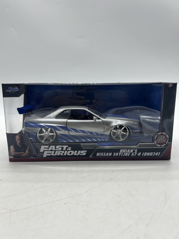 FAST & FURIOUS NISSAN SKYLINE GT-R R34 DIECAST CAR: For ALTERNATE shipping quote or LOCAL PICK-UP DETAILS, please visit dejavuauctionshipping.com FAST & FURIOUS BRIAN O’CONNER NISSAN SKYLINE GT-R R34 1:24 DIECAST MODEL BY JADA TOYS Highly collectible