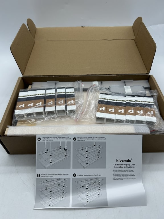 ACRYLIC DIECAST CAR DISPLAY CASE SHELF ORGANIZER: For ALTERNATE shipping quote or LOCAL PICK-UP DETAILS, please visit dejavuauctionshipping.com ACRYLIC DIECAST CAR DISPLAY CASE SHELF ORGANIZER MULTI-TIER MODEL CAR DISPLAY New in box acrylic display c