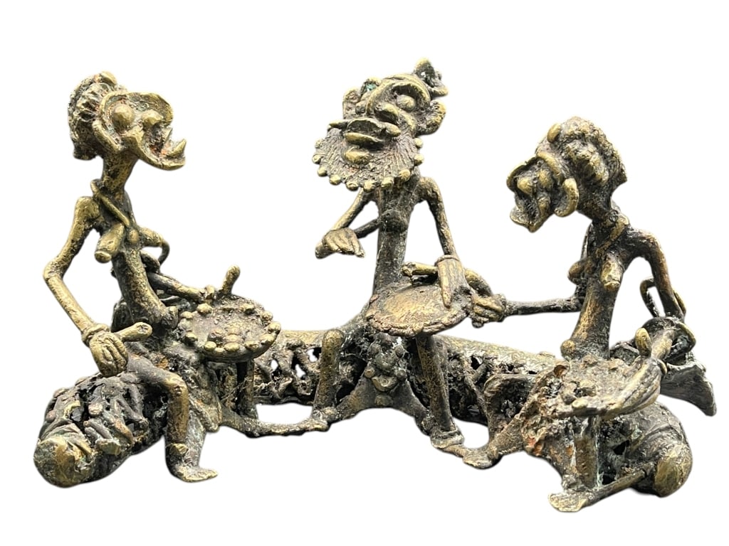 AFRICAN TRIBAL BRASS DRUMMERS FIGURAL SCULPTURE: For ALTERNATE shipping quote or LOCAL PICK-UP DETAILS, please visit dejavuauctionshipping.com HANDCRAFTED AFRICAN TRIBAL STYLE BRASS FIGURAL SCULPTURE DEPICTING THREE MUSICIANS PLAYING DRUMS, FEATURIN