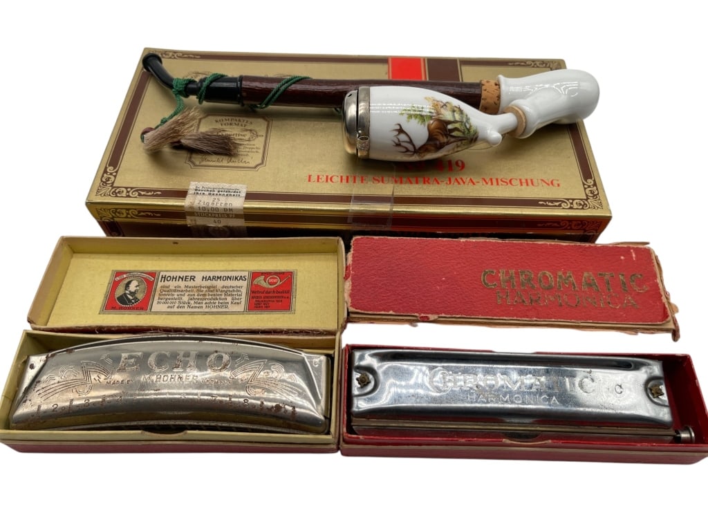 VINTAGE HARMONICA & DECANTER SMOKING ACCESSORY LOT: For ALTERNATE shipping quote or LOCAL PICK-UP DETAILS, please visit dejavuauctionshipping.comMixed vintage lot featuring two harmonicas including a Hohner “Echo” harmonica in original box and