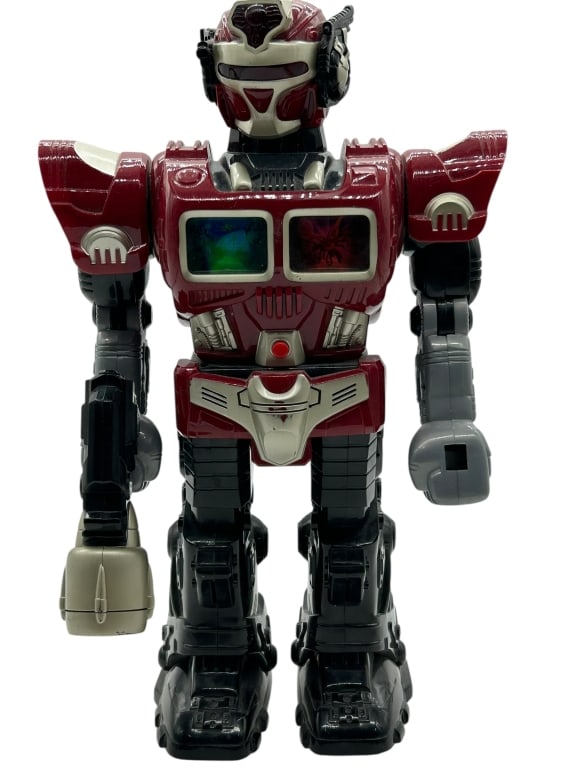 VINTAGE ELECTRONIC LIGHT-UP ROBOT ACTION FIGURE: VINTAGE STYLE ELECTRONIC ROBOT FIGURE RED BLACK LIGHT UP ACTION TOYFuturistic vintage-style electronic robot toy featuring bold red, black, and silver molded plastic construction with integrated