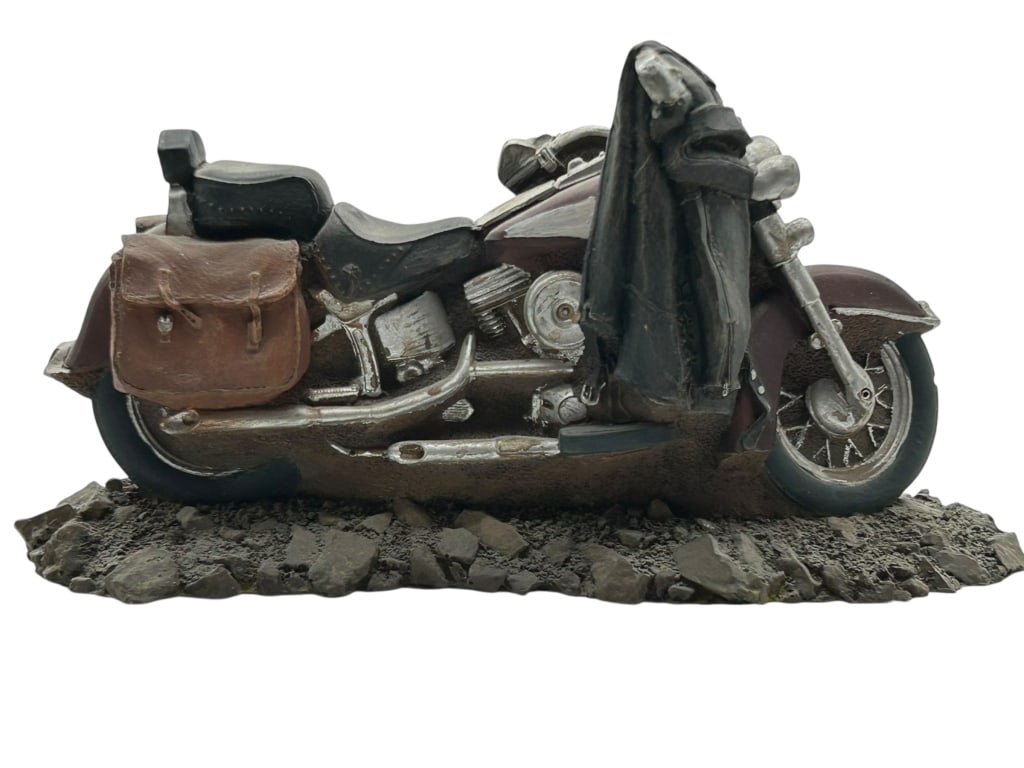 VTG MOTORCYCLE SCULPTURE FIGURAL DISPLAY 9.5": VINTAGE STYLE MOTORCYCLE SCULPTURE WITH SADDLEBAG FIGURAL DISPLAYDetailed vintage-style motorcycle sculpture featuring a classic cruiser design with textured road base, realistic engine detailing,