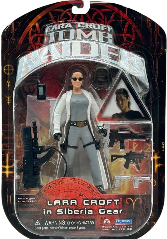LARA CROFT SIBERIA GEAR TOMB RAIDER ACTION FIGURE: LARA CROFT IN SIBERIA GEAR TOMB RAIDER ACTION FIGURE Vintage Lara Croft in Siberia Gear action figure from Tomb Raider, presented in original blister card packaging with multiple accessories including