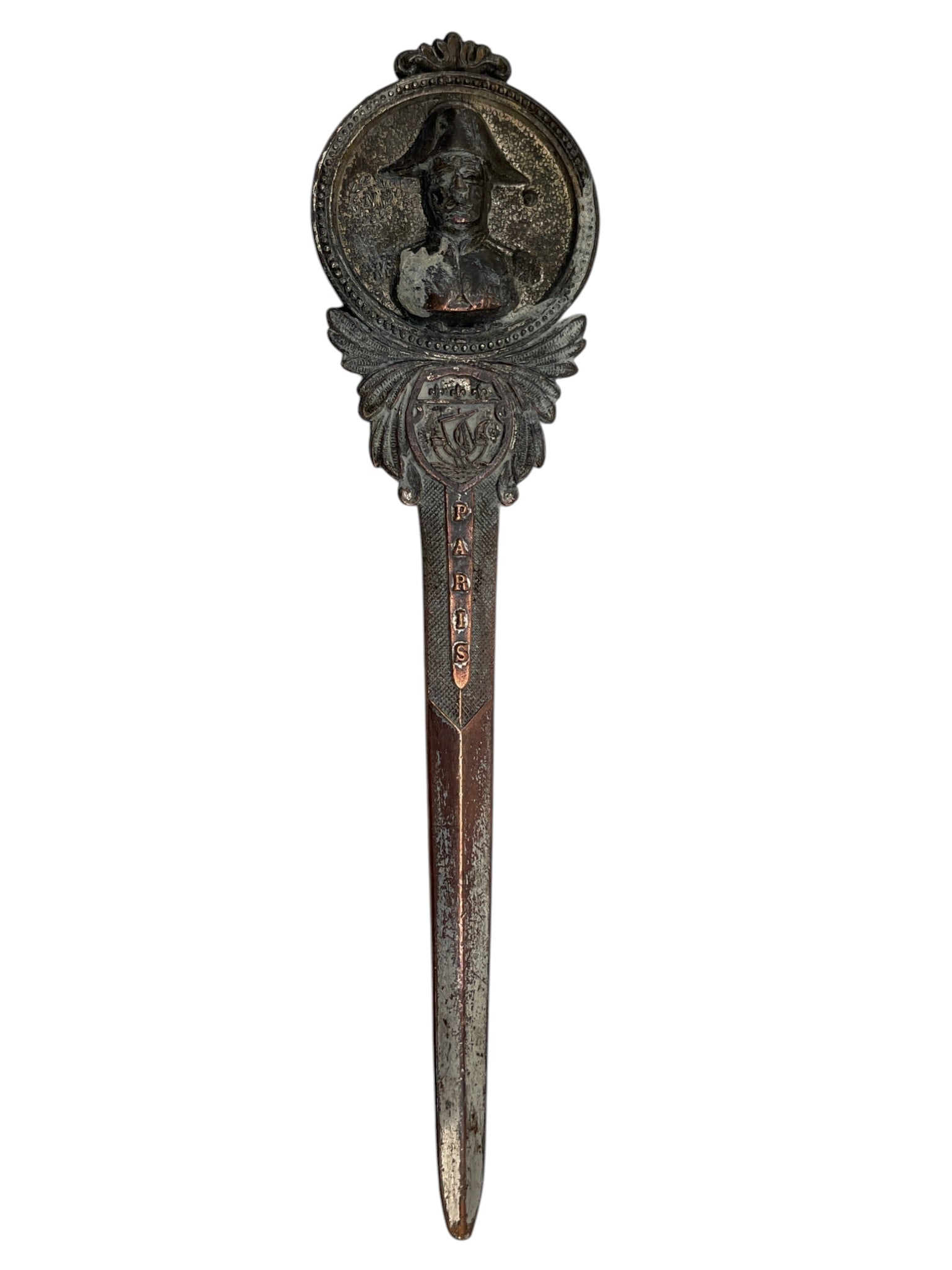 PARIS SOUVENIR LETTER OPENER | FIGURAL HANDLE: ESTIMATE: $20–$40VINTAGE PARIS SOUVENIR METAL LETTER OPENER WITH FIGURAL HANDLEVintage Paris souvenir metal letter opener featuring an ornate figural handle with raised imagery of Paris landmarks