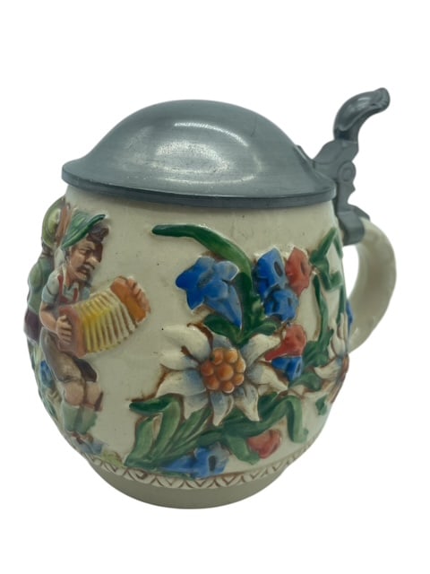 GERMAN RELIEF POTTERY BELLY BEER STEIN PEWTER LID: 5" TALL In excellent vintage condition Made in germany By bidding on this listing, you understand and agree to be bound by the terms and conditions of DejaVu Auctions. *For ALTERNATE shipping quote or