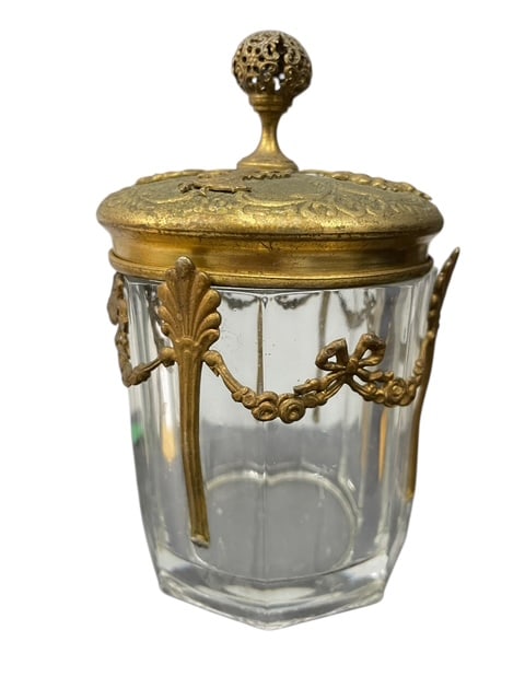 VTG GILT METALGLASS VANITY DRESSER JAR W/ LID: Vintage Gilt Metal & Glass Covered Vanity Jar / Dresser BoxElegant vintage vanity jar featuring a faceted clear glass body with an ornate gilt metal (likely brass or ormolu-style) mount and lid. The