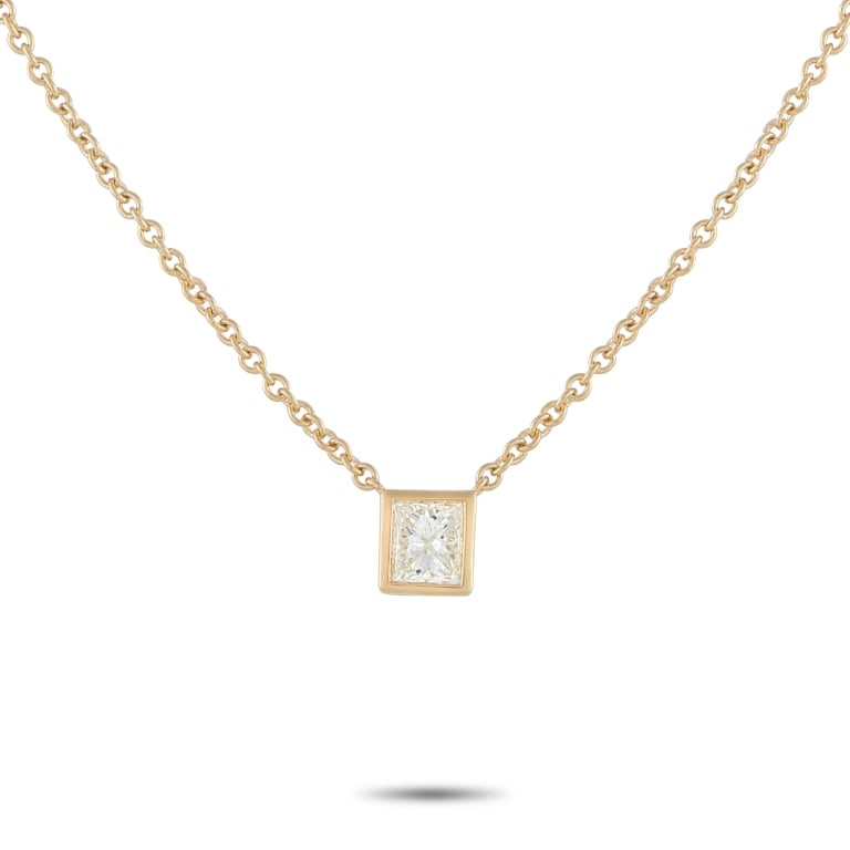 18K GOLD 0.60CT PRINCESS-CUT DIAMOND NECKLACE: *SPECIAL SHIPPING on Luxury Jewelry READ BELOW* A simple and refined piece perfect for daily wear. A sharp, square princess-cut diamond takes center stage, its facets catching light with crisp, geomet