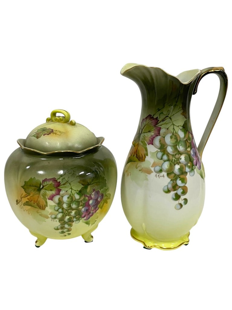 A&C BAVARIA PORCELAIN GRAPE PITCHER & BISCUIT JAR: *for alternative shipping options please go to www.dejavuauctionshipping.com -HAND PAINTED A&C BAVARIA PORCELAIN GRAPE MOTIF PITCHER AND BISCUIT JAR WITH LID -Charming two piece hand painted porcelain