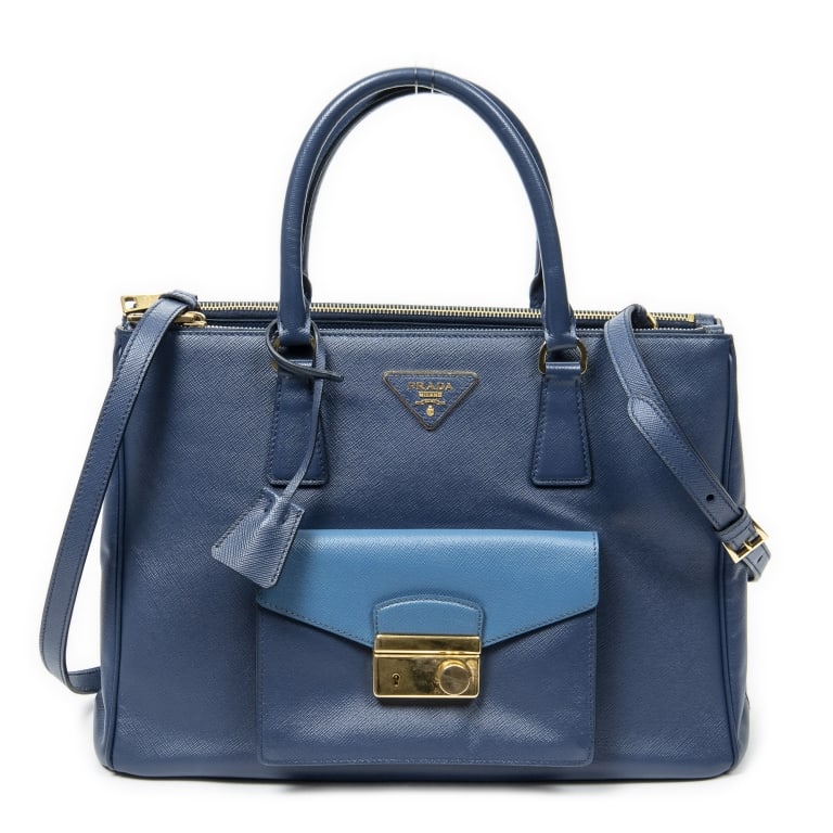 PRADA LARGE GALLERIA POCKET TOTE NAVY SAFFIANO BAG: Prada Large Galleria Front Pocket Tote Navy Saffiano Leather Gold * COLOR: Navy * PRODUCTION CODE: 7B * INCLUDED: Strap, Key(s) in Clochette A * CONDITION: 33.5*24*14.5cm * (3cm = 1inch approximately)