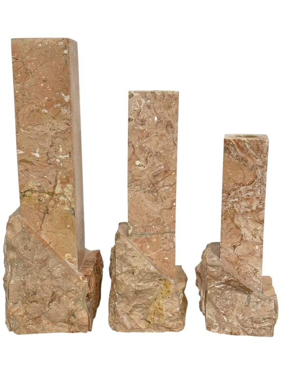 MAITLAND SMITH TESSELLATED STONE CANDLESTICKS 12": -MAITLAND SMITH TESSELLATED STONE SCULPTURAL CANDLESTICKS SET OF THREE -Set of three sculptural Maitland Smith candlesticks crafted in tessellated stone, featuring striking geometric columns rising fr