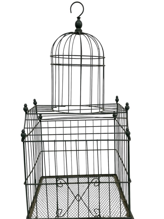 VINTAGE DECORATIVE METAL BIRD CAGE 24": VINTAGE DECORATIVE METAL BIRD CAGE DISPLAY 24" X 13" X 13" APPROX -Vintage decorative metal bird cage featuring a tall rectangular body with domed top and hanging hook finial. Constructed of black pai