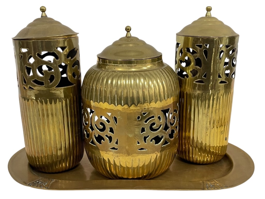 3 BRASS PIERCED CANDLE HOLDERS W MATCHING TRAY: *for alternative shipping options please go to www.dejavuauctionshipping.com -BRASS PIERCED CANDLE HOLDERS WITH MATCHING TRAY – 4 PIECE SET -Decorative vintage brass set including three pierced bras