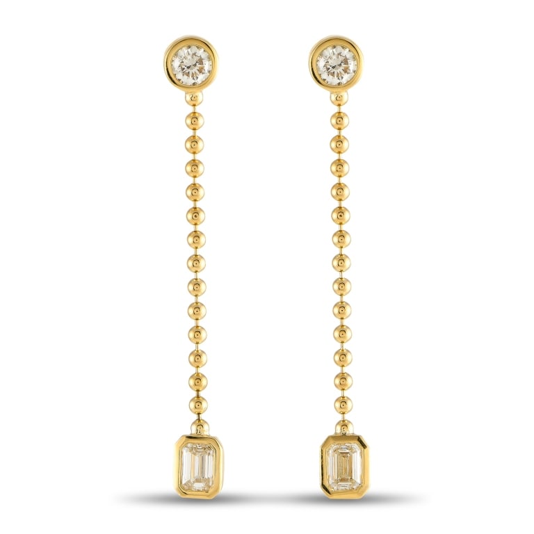 18K YELLOW GOLD 1.40CT DIAMOND DANGLE EARRINGS: *SPECIAL SHIPPING on Luxury Jewelry READ BELOW* These earrings are designed to continually capture your imagination. Round cut Diamonds and emerald cut Diamonds with a total weight of 1.40 carats book