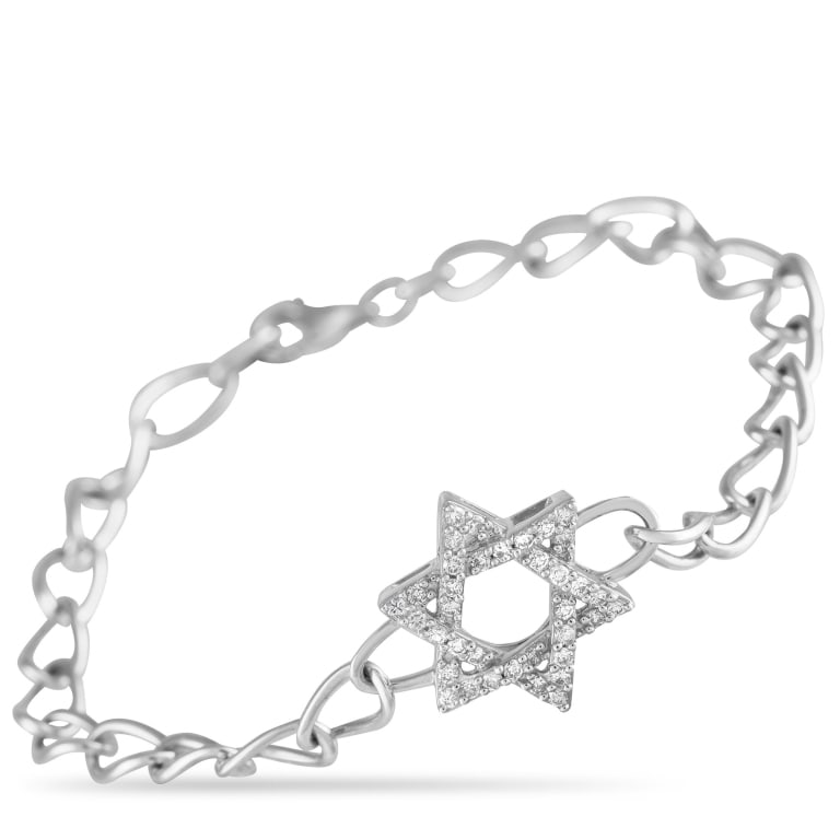 14K WG .30CT DIAMOND STAR OF DAVID BRACELET: *SPECIAL SHIPPING on Luxury Jewelry READ BELOW* This classically elegant bracelet is poised to make a statement. At the center, a stunning six pointed star pendant is elevated by inset Diamonds