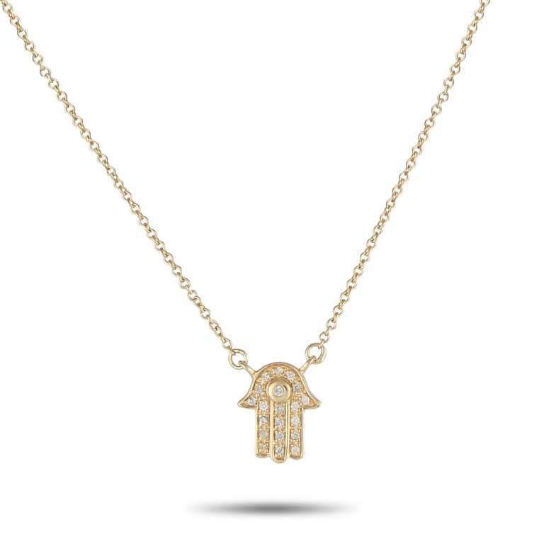 14K YG 0.10CT DIAMOND HAMSA PENDANT NECKLACE: *SPECIAL SHIPPING on Luxury Jewelry READ BELOW* A stylish spiritual symbol makes this 14K Yellow Gold necklace simply unforgettable. Meant to provide good luck and protection to the wearer, the Hamsa