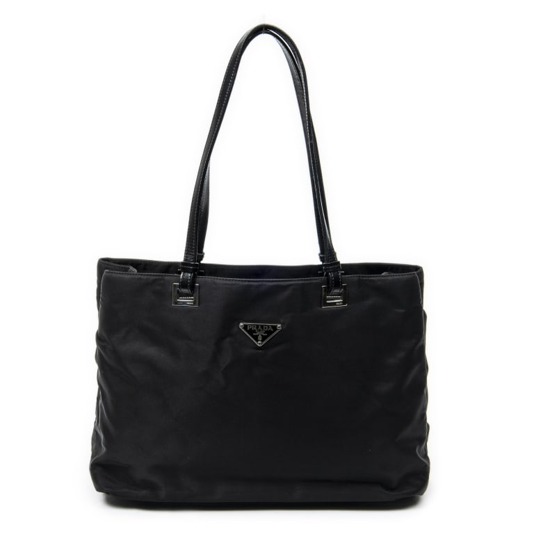 PRADA MEDIUM OPEN TOTE BLACK NYLON BAG: Prada Medium Open Tote Black Nylon Canvas Silver * COLOR: Black * PRODUCTION CODE: 50/2 * INCLUDED: None A * CONDITION: 31*22*10cm * (3cm = 1inch approximately) * Luxury bags are kept offsite