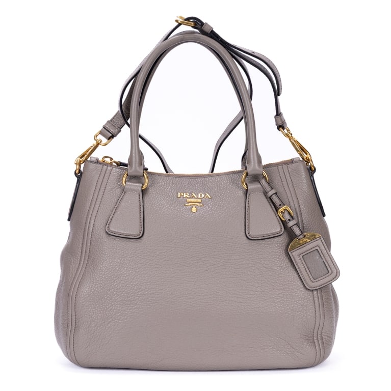 PRADA CONVERTIBLE ZIP TOTE GREY VITELLO BAG: Prada Convertible Zip Tote Grey Vitello Phenix Leather Gold * COLOR: Grey * PRODUCTION CODE: 1BC032 / 197/B * INCLUDED: Strap, Luggage Tag A * CONDITION: 31*25*13cm * (3cm = 1inch approximately) * Lux