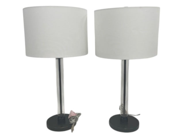 VINTAGE GLASS CYLINDRICAL PAIR LAMPS MODERN 29": Form: Clean, minimalist cylindrical design Base: Black round metal base Stem: Slim vertical rod (likely metal with a chrome or brushed finish) Shade: White drum shades (simple, contemporary replacemen