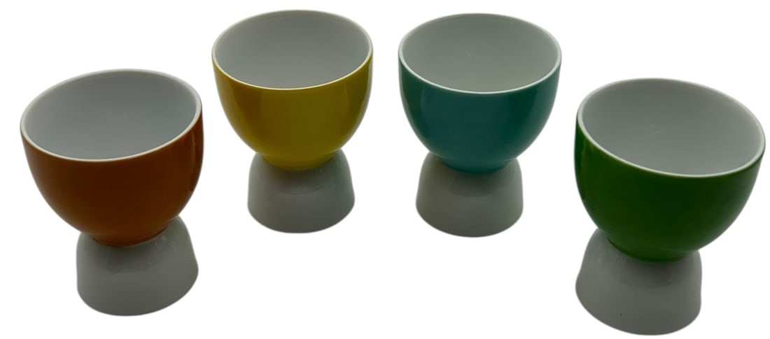 SET OF 4 MODERN COLOR BLOCK CERAMIC EGG CUPS 3": SET OF 4 MODERN COLOR BLOCK CERAMIC EGG CUPS Stylish set of four modern ceramic egg cups featuring a sleek two-tone design with glossy colored tops in warm orange, mustard yellow, teal, and green, pai