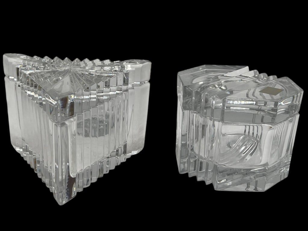 LOT OF 2 HEAVY CUT GLASS COVERED BOXES TRINKET: GROUP OF 2 GEOMETRIC CUT GLASS COVERED TRINKET OR VANITY BOXES Group of two heavy cut glass covered boxes in striking geometric forms, including one larger triangular example and one smaller square fo