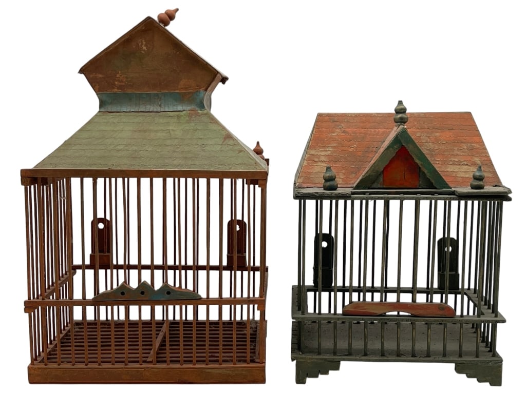 PAIR OF DECORATIVE VINTAGE BIRDCAGES CAGES: PAIR OF VINTAGE DECORATIVE BIRDCAGES WITH PAGODA STYLE ROOFS Pair of vintage decorative birdcages in contrasting forms, including one larger wood and metal example with a pagoda style roof and one sma