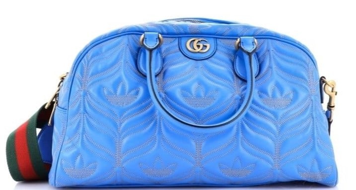 GUCCI ADIDAS DUFFLE MEDIUM BLUE QUILTED BAG: Gucci Adidas Duffle Medium Blue Quilted Leather Gold * COLOR: Blue * PRODUCTION CODE: 722114-520981 * INCLUDED: Strap, Dustbag AA * CONDITION: 41*23*13cm * (3cm = 1inch approximately) * Luxury bags ar