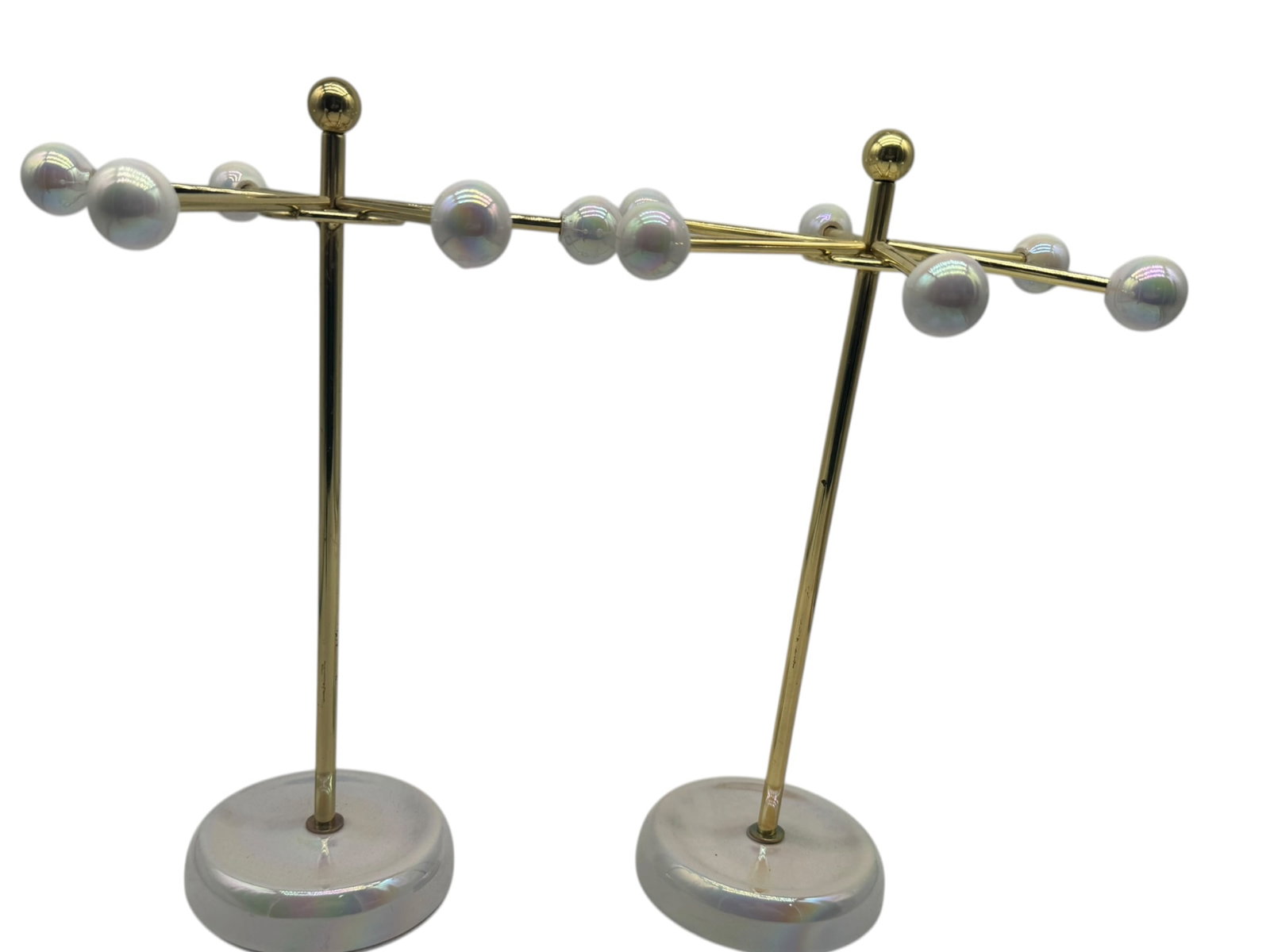 PAIR OF MODERN BRASS & PEARL JEWELRY DISPLAYS: PAIR OF MODERN BRASS & PEARL ACCENT JEWELRY DISPLAYS ON MARBLE BASES -A stylish pair of contemporary jewelry display stands featuring brass-tone metal arms adorned with pearl-like accents, mounted on