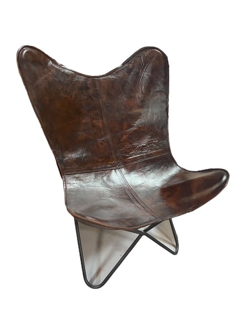 NWT SLING BUTTERFLY BROWN LEATHER CHAIR: -SLING BUTTERFLY BROWN LEATHER ACCENT CHAIR -Dimensions: Approximately 35" H x 30" W x 30" D. -Material: Typically crafted from a blend of canvas and leather (e.g., 70% canvas/30% leather or 90%/10% v