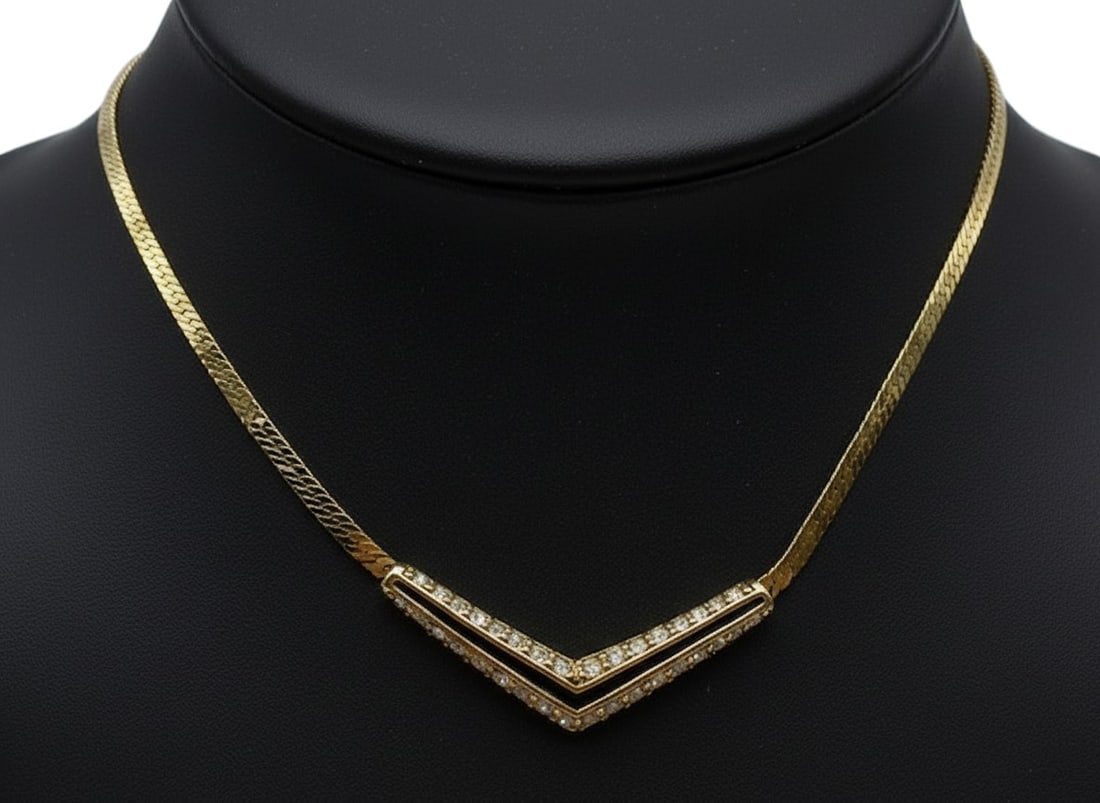VINTAGE SWAROVSKI CRYSTAL GOLD TONE V BAR CHOKER: 16" IN LENGTH EXCELLENT CONDITION By bidding on this listing, you understand and agree to be bound by the terms and conditions of DejaVu Auctions. *For ALTERNATE shipping quote or LOCAL PICK-UP DETAIL
