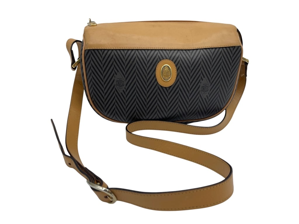 VINTAGE MARK CROSS CROSSBODY BAG BLACK CHEVRON: Vintage Mark Cross crossbody bag, crafted in black chevron-pattern coated canvas with tan leather trim, adjustable shoulder strap, and gold-tone crest medallion closure. Classic equestrian-inspired st