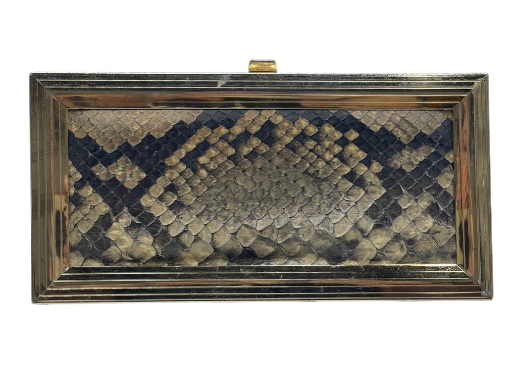 VTG 80'S MARGOLIN METAL FRAME SNAKESKIN EVE BAG: Margolin designer bag. Measures 8" x 4" x 1.5" in size Good condition with wear consistent with age. msn * By bidding on this listing, you understand and agree to be bound by the terms and conditions 