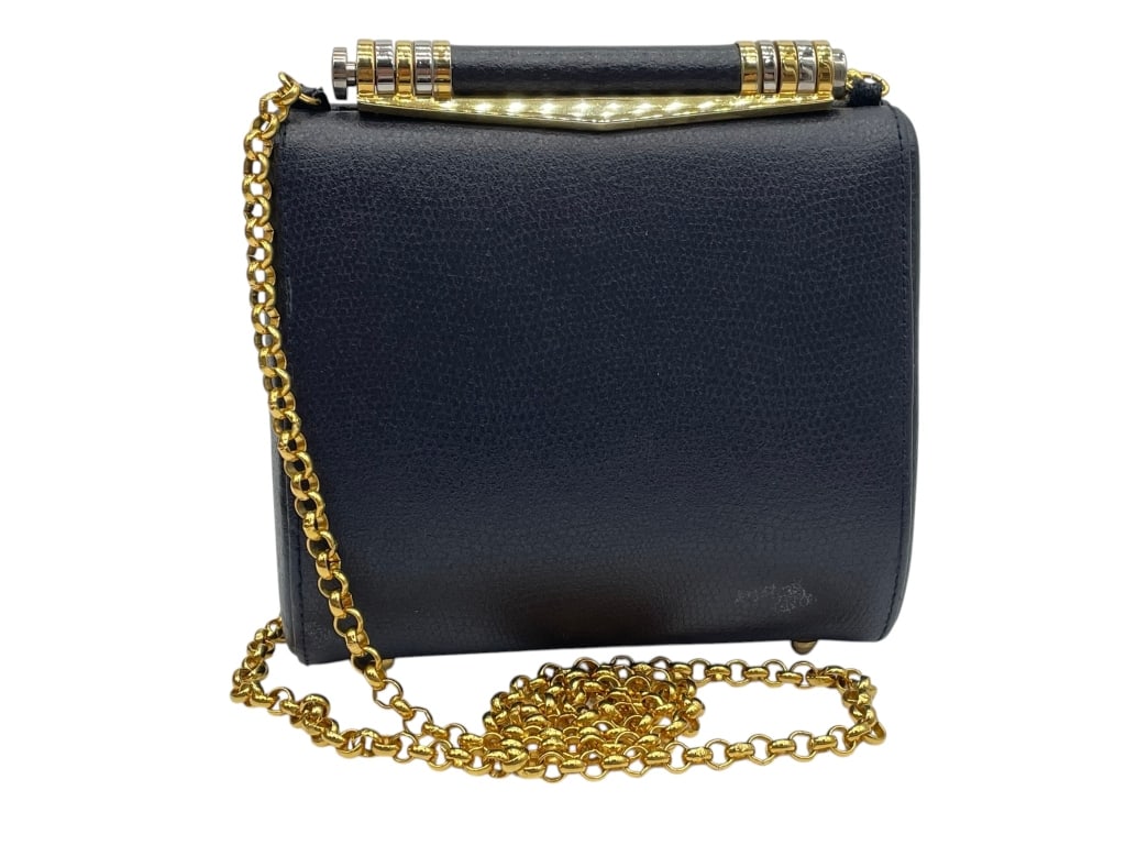 VINTAGE 60'S MID MOD ART DECO FRAME NAVY EVE BAG: UNSIGNED but adorable and exquisite workmanship, navy pleather with art deco roll top frame with large triangular bar that rolls over the top. Lined inside in navy also. Measures 6" tall. msn260515 * 