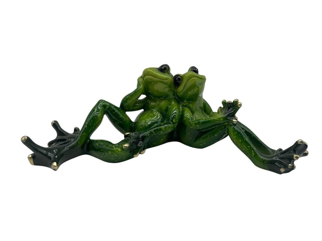 WHIMSICAL CERAMIC FROG FIGURINE DUO 9": Ceramic figurine featuring two green frogs sitting back-to-back with legs extended. Measures approximately 9" W | | Shipping Available at www.DeJaVuAuctionShipping.com. By bidding in this auction you 