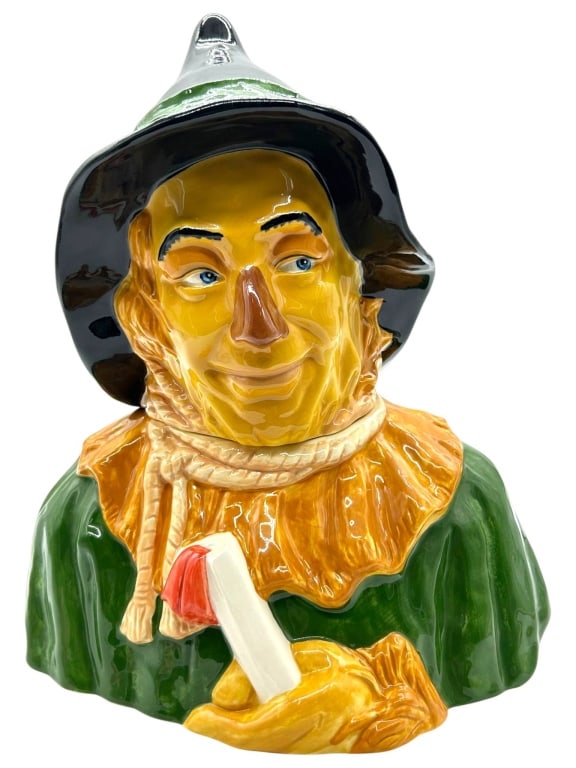STAR JARS WIZARD OF OZ SCARECROW COOKIE JAR 16": Stars Jars brand ceramic Scarecrow cookie jar from The Wizard of Oz. Limited edition 847/1939. Measures approximately 16 inches high and 13 inches wide at base. | | Condition noted as good with no obv