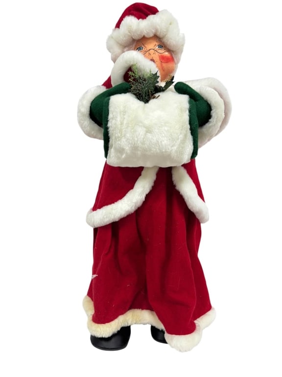 36 INCH SANTA CLAUS DECORATION FIGURE: Santa Claus figure, 36 inches tall, dressed in red and white fabric with faux fur trim and black boots. Includes decorative green and white muff with attached greenery. Condition as shown. Shipping Av