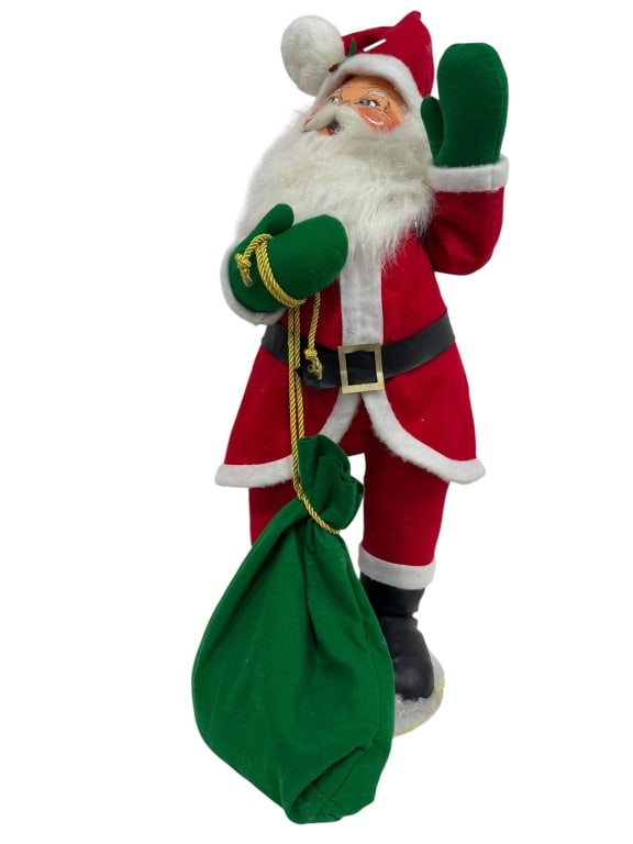 SANTA CLAUS FIGURINE RED SUIT GREEN BAG: Santa Claus figurine featuring a red suit and white trim, black boots, and a green bag with gold rope. Constructed from mixed materials including fabric and plastic. | | Shipping Available at