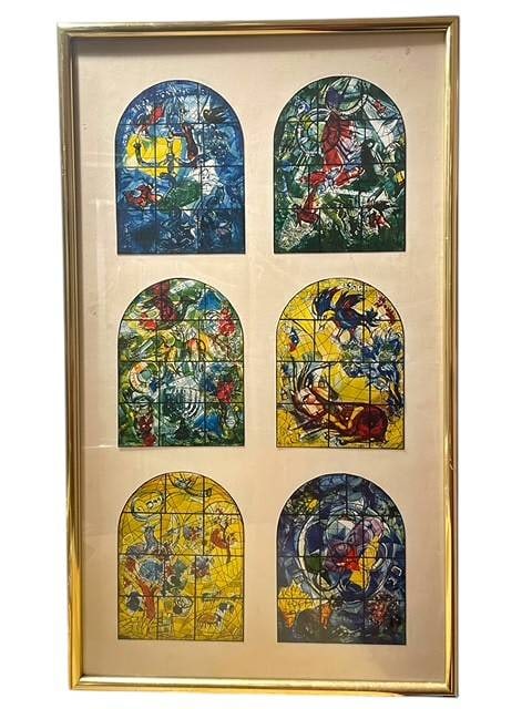 VINTAGE 1960S MARC CHAGALL STAINED GLASS WINDOWS L: Vintage lithograph, likely dating to the 1960s, featuring six richly colored arched stained-glass window designs by Marc Chagall. The work presents vivid Judaica-inspired imagery with abstract figures