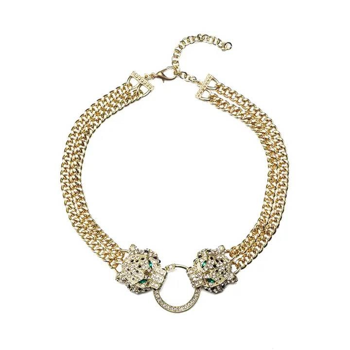 NEW EYE CANDY CZ JAG NECKLACE: Gold tone brass choker necklace featuring two jaguar motifs with CZ crystals. Approximate length is 12 inches and closure is lobster clasp. Shipping Available at www.DeJaVuAuctionShipping.com. By bidd