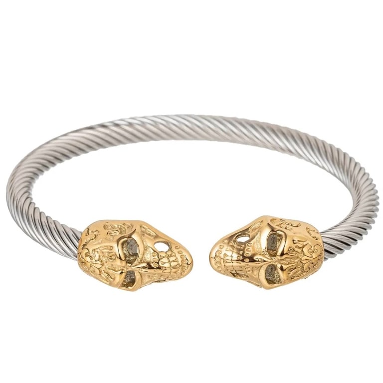NEW EYE CANDY DOUBLE HEAD SKULL BRACELET: NEW EYE CANDY double head skull bracelet featuring twin gold skull head pendants on a silver titanium wire band, two-tone design. Also available in silver. Shipping Available at www.DeJaVuAuctionShipp